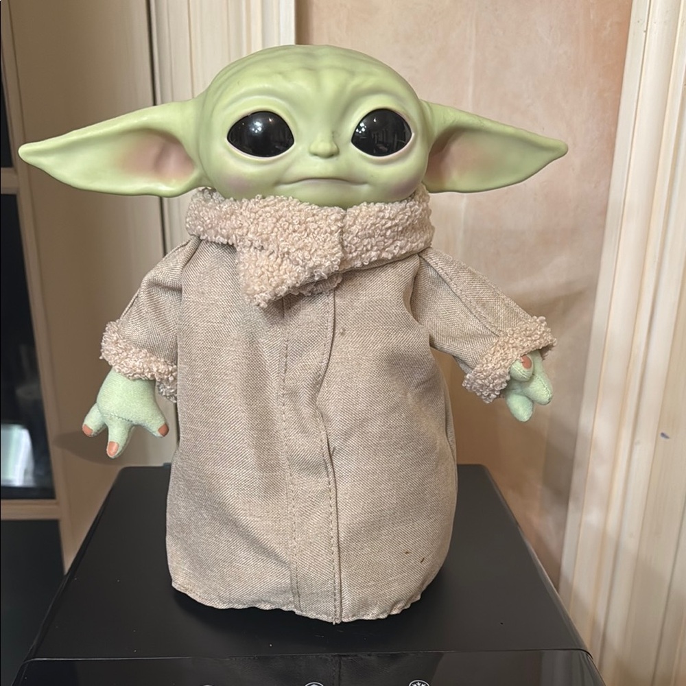 Amazon Green and Tan Action Figure with Expressive Eyes and Soft Robe